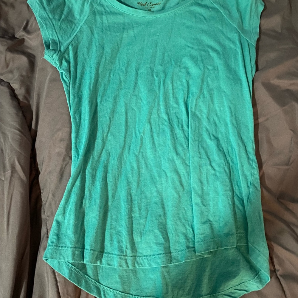 A blue green tee